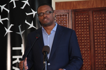Deputy Premier of Nevis and Minister of Tourism Hon. Mark Brantley delivers remarks at a ceremony to launch the Tradewind Aviation’s nonstop flight from San Juan to the Vance Amory International Airport on November 02, 2013